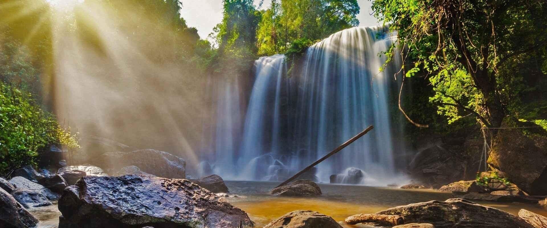 Waterfalls of Phnom Kulen in Cambodia on a scenic Phnom Kulen Travel banner by Legend Travel Group.